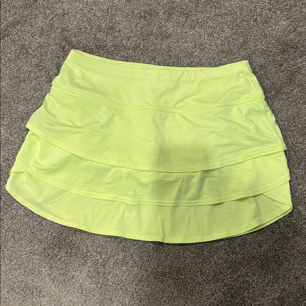 Athleta fluorescent yellow layered ruffled tennis workout skirt built-in shorts